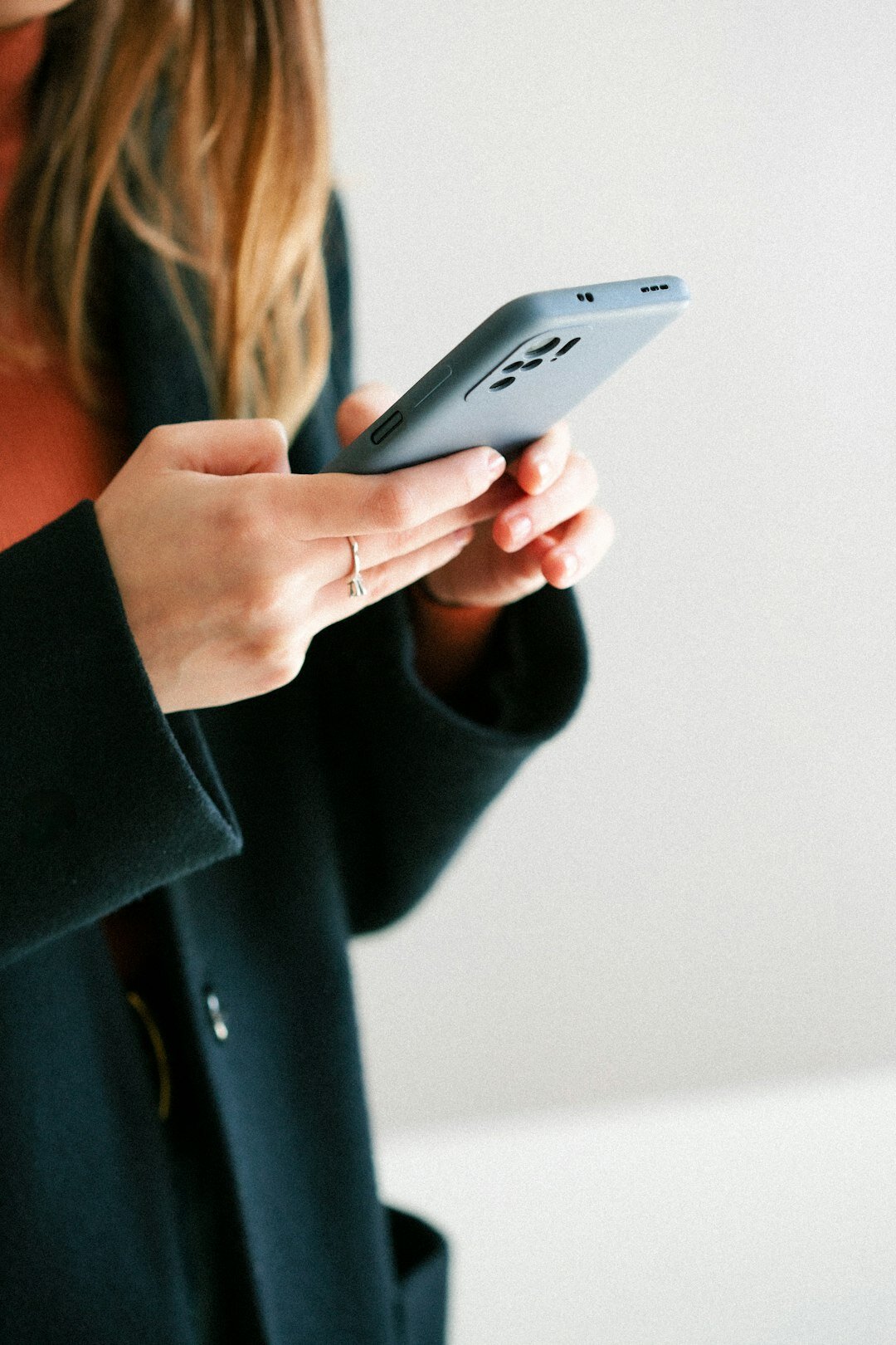 person reading news on phone